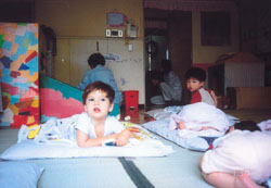 Children at play at a day-care center in western Tokyo