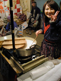 Vendors sell cups of hot, sweet amazake