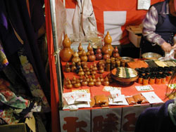 A stall laden with shichimi togarashi, a seasoning made of seven spices