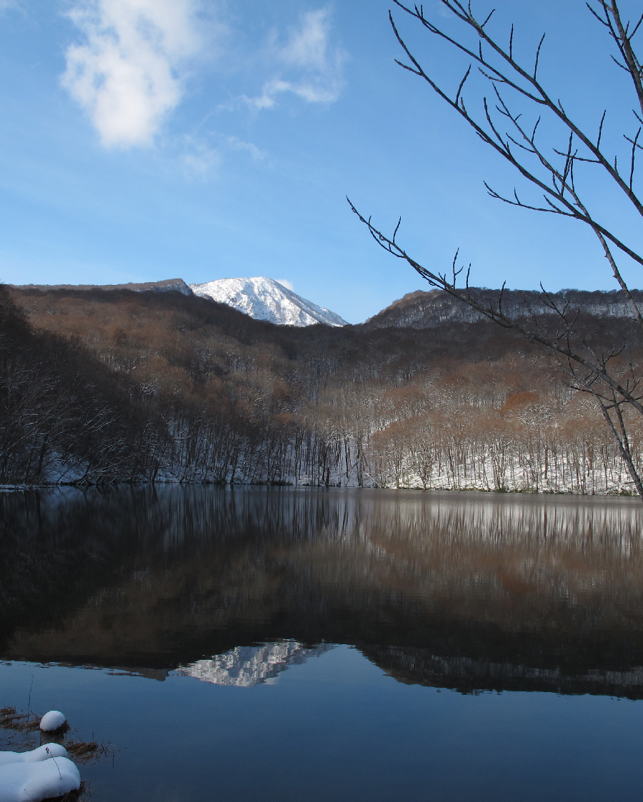 Mount Akakura reflects off Tsuta Numa, Hakkoda Mountain Range, Aomori Pref.