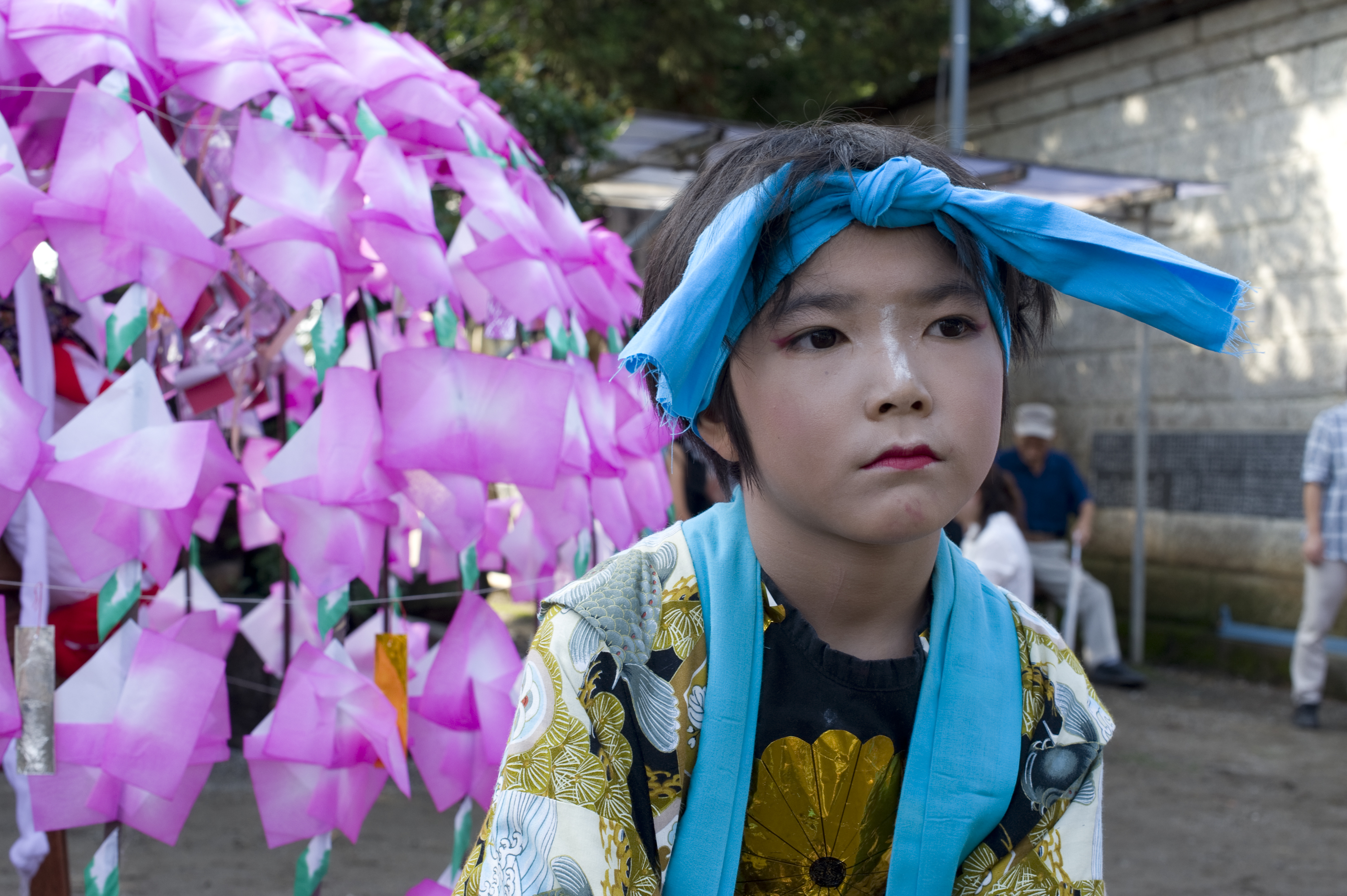 A youth reflects after dancing in the Horo Festival in Kawagoe, Saitama Pref.