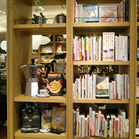 A selection of appliances and related books are on display.