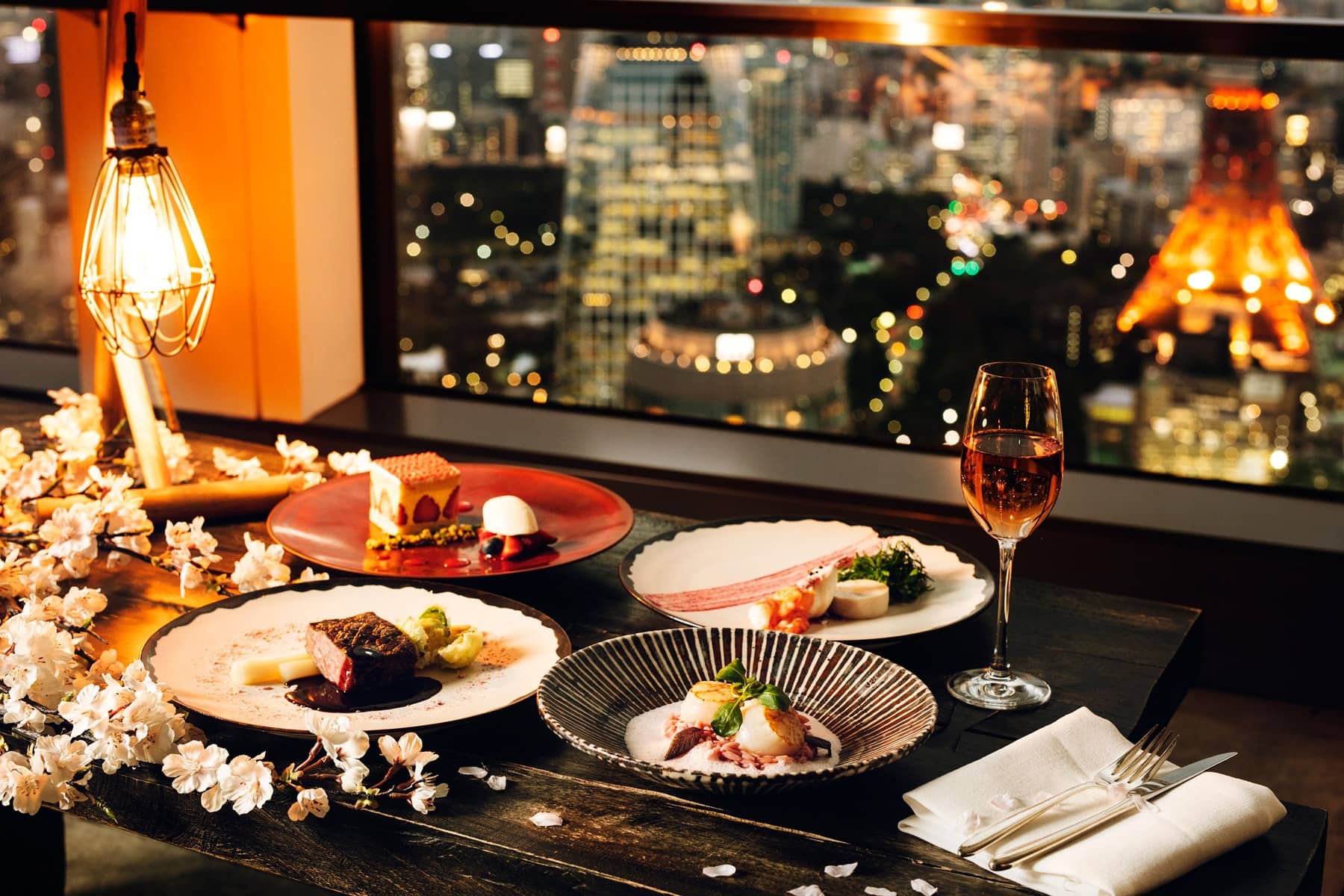 Revel in a dreamlike, sakura-themed dinner overlooking the city