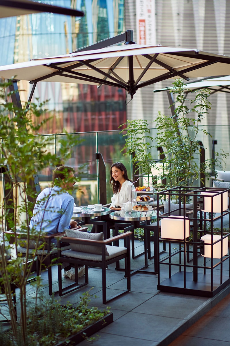 Drinks and savory dishes are served at the lobby lounge, which is connected to the terrace.