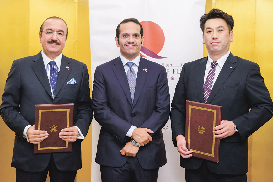 The QFF signed an agreement with Onagawa Mayor Yoshiaki Suda (right) on Oct. 3 for ¥1 billion to build a unified elementary and junior high school in the town at a ceremony in Tokyo, attended by Qatar's Ambassador Yousef Bilal (left) and Minister of Foreign Affairs Sheikh Mohammed bin Abdulrahman Al-Thani. | QATAR FRIENDSHIP FUND