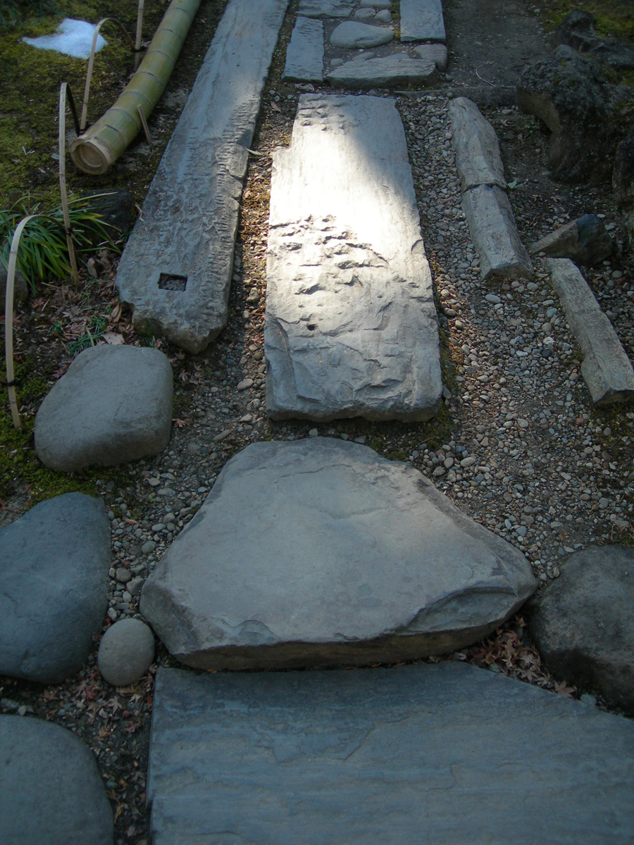 Spotlight on a stone sidewalk