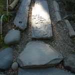 Spotlight on a stone sidewalk