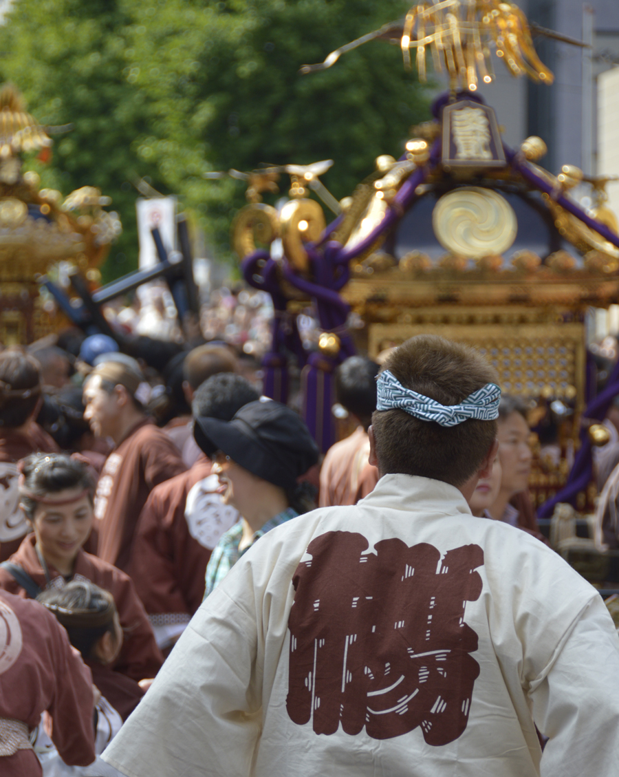 Watching the mikoshi parade at Kanda Festival, Tokyo