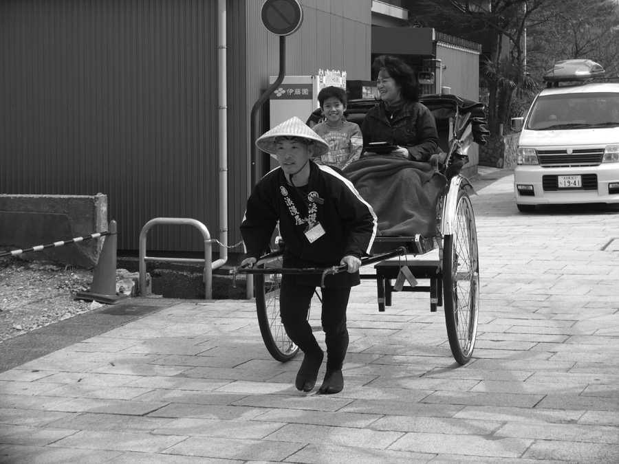 Japanese rickshaw in modern world at Higashi Chaya District, Kanazawa, Ishikawa Pref.